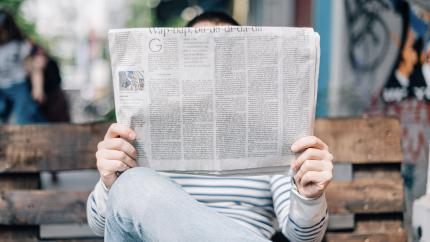 Man reading a newspaper