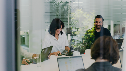 Image of ClimatePartner employees during a meeting