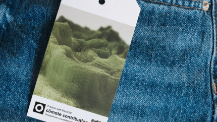 FCC tag on blue jeans