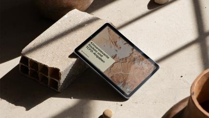 person-holding-tablet