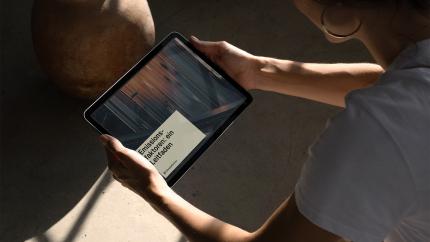 person-holding-tablet