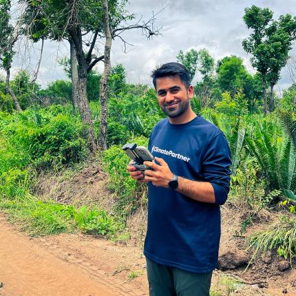 Project developer planting trees