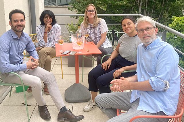 team paris climatepartner sitting on table