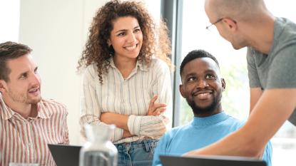 office people talking and laughing